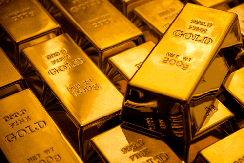 investir em ouro: várias barras de ouros