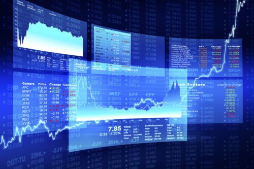 mini-índice: uma tela azul, com vários gráficos mostrando as variações do mercado financeiro.
