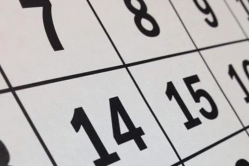 Imagem de um calendário em close, destacando o dia 14, sugerindo planejamento e organização de atividades ou compromissos.