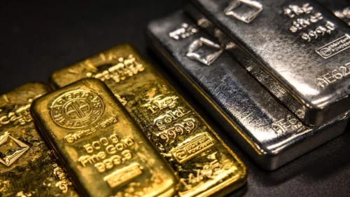 ouro e prata em queda após recordes